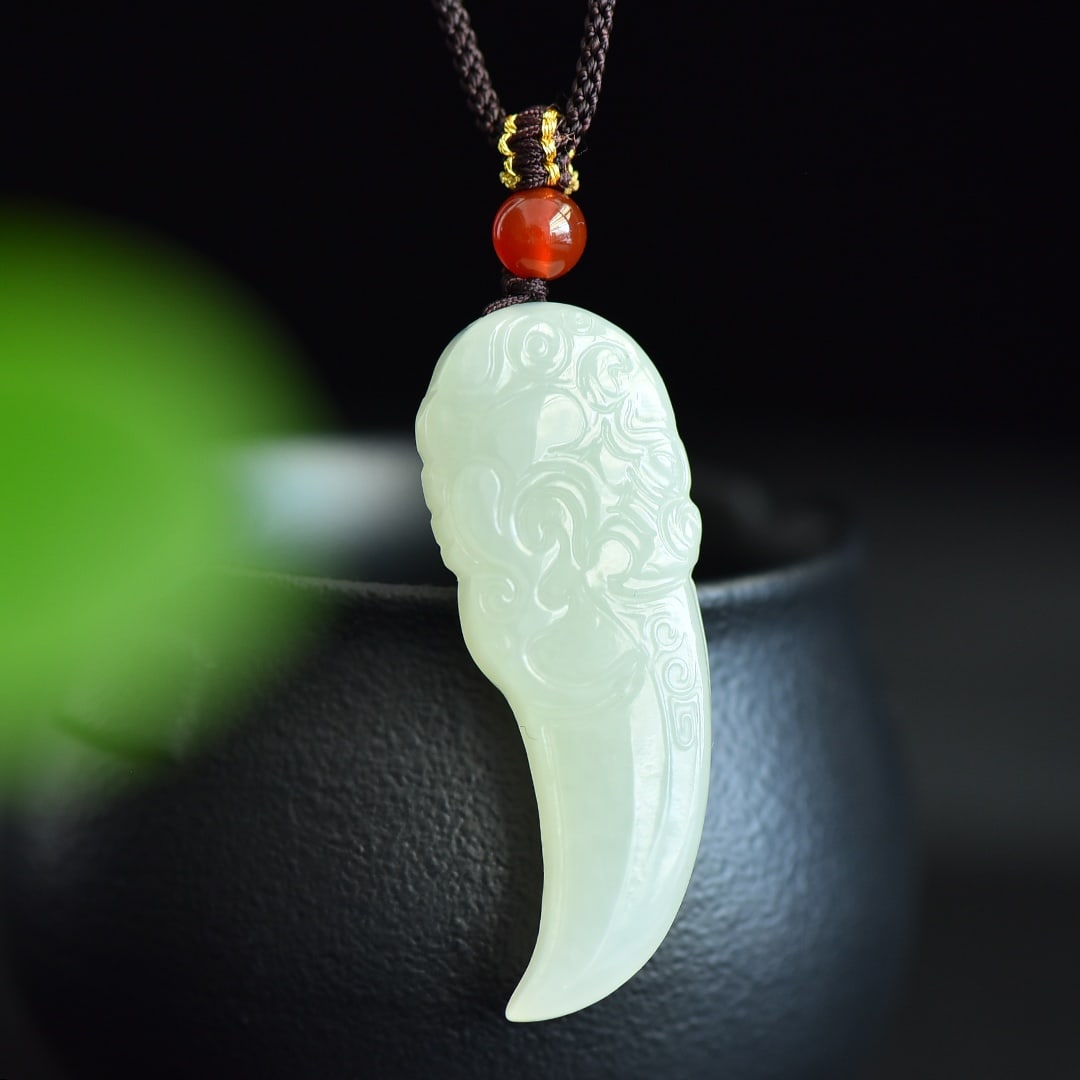 An Exquisite White Jade Pendant: An Exquisite White Jade Pendant,Size:48mmx18mm 白玉吊坠
