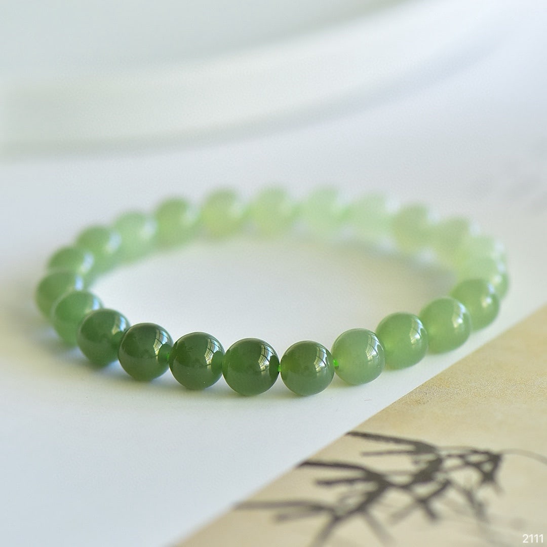 An Exquisite Greenish Jade Bracelets (1 of 5)