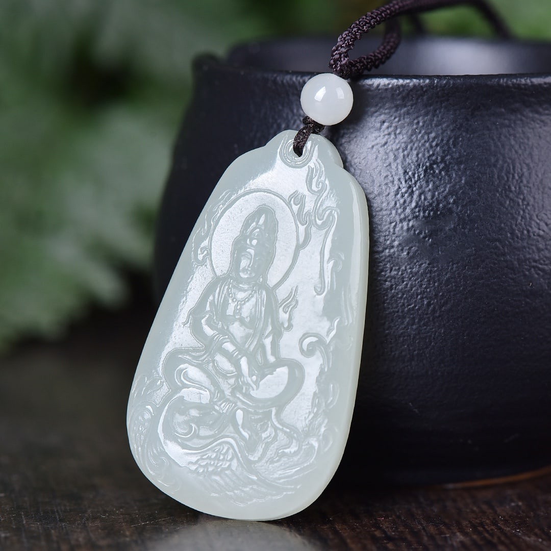 An Exquisite White Jade Avalokitesvara Pendant: An Exquisite White Jade Avalokitesvara Pendant,Size:46mmx27mm 
