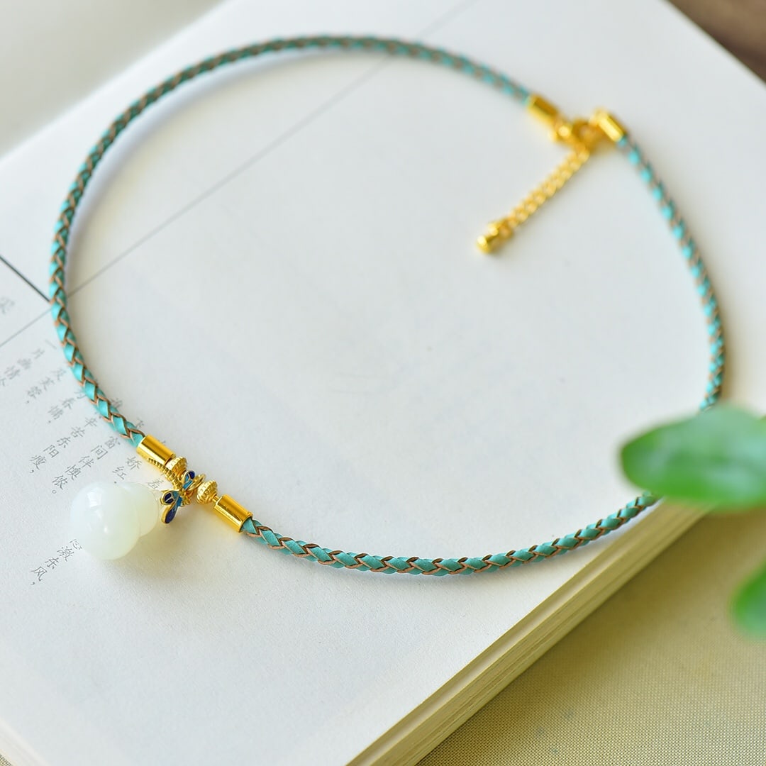 An Exquisite Sterling Silver-Gold Plated Inlaid White Jade Enamel Pendant: An Exquisite Sterling Silver-Gold Plated Inlaid White Jade Enamel Pendant 纯银镀金镶白玉珐琅吊坠