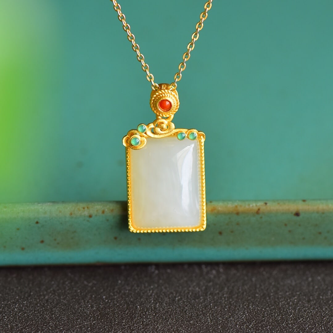 An Exquisite Sterling Silver-Gold Plated Inlaid White Jade Pendant: An Exquisite Sterling Silver-Gold Plated Inlaid White Jade Pendant 纯银镀金镶白玉吊坠