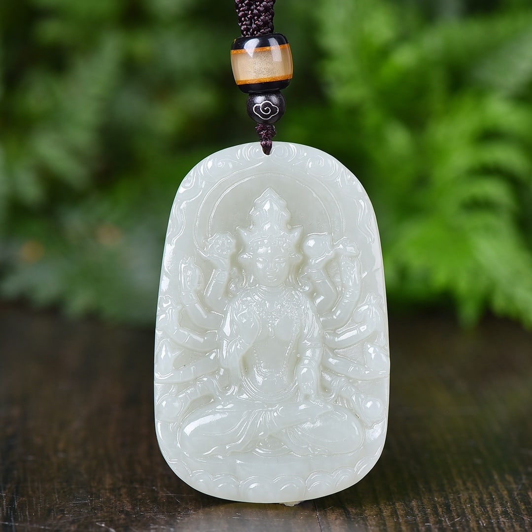 An Exquisite White Jade Avalokitesvara Pendant: An Exquisite White Jade Avalokitesvara Pendant,Size:58mmx39mm 白玉观音像吊坠
