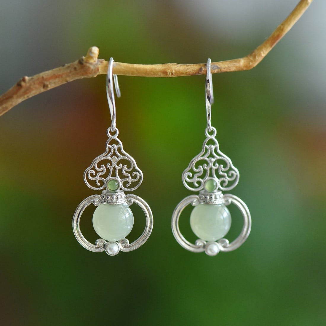 A Pair of Exquisite Sterling Silver Inlaid Greenish Jade Gourd Earrings: A Pair of Exquisite Sterling Silver Inlaid Greenish Jade Gourd Earrings,Size:8mmx8mm 一对纯银镶青白玉葫芦耳环