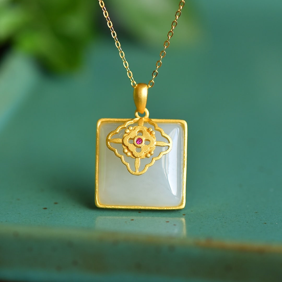 An Exquisite Sterling Silver-Gold Plated Inlaid White Jade Pendant: An Exquisite Sterling Silver-Gold Plated Inlaid White Jade Pendant 纯银镀金镶白玉吊坠