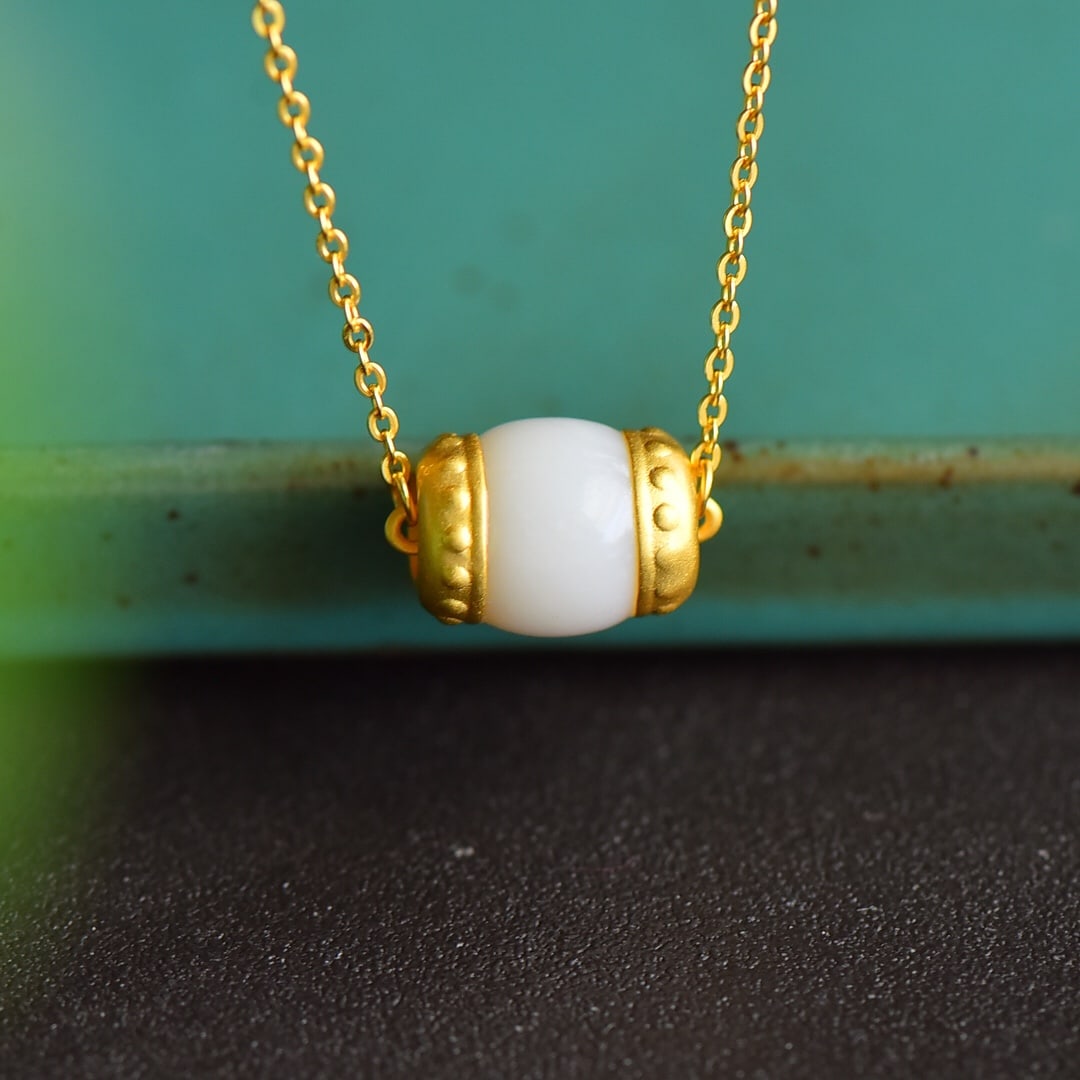 An Exquisite Sterling Silver-Gold Plated Inlaid White Jade Pendant: An Exquisite Sterling Silver-Gold Plated Inlaid White Jade Pendant 纯银镀金镶白玉吊坠