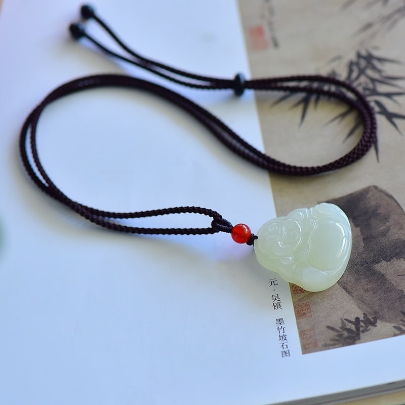 An Exquisite White Jade Maitreya Buddha Pendant: An Exquisite White Jade Maitreya Buddha Pendant,Size:30mmx30mmx7mm 寓意:吉祥 心怀天下 能容天下事 