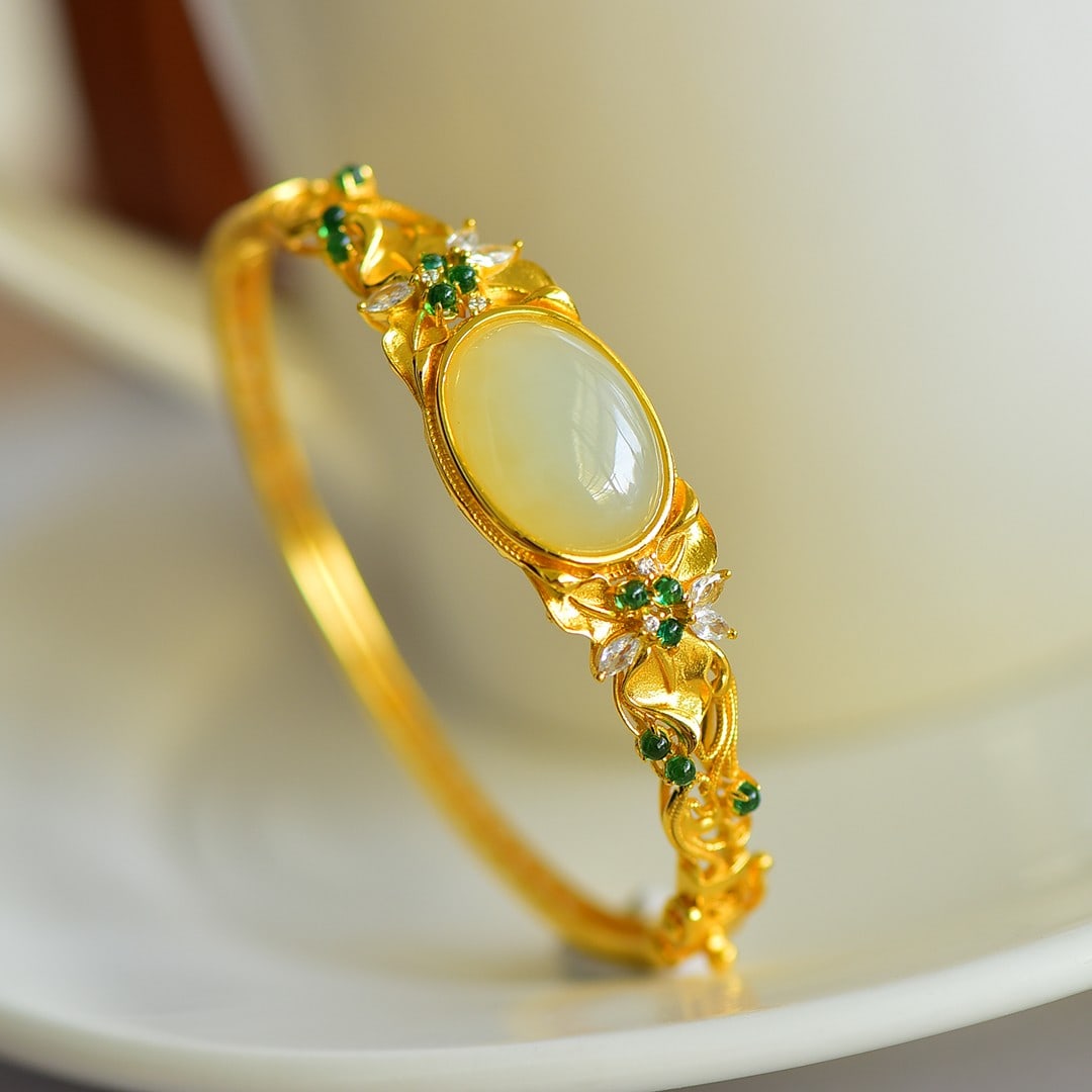 An Exquisite Sterling Silver-Gold Plated Inlaid White Jade Bracelets,Inlaid Diamonds: An Exquisite Sterling Silver-Gold Plated Inlaid White Jade Bracelets,Inlaid Diamonds,Size:13mmx18mm 纯银镀金镶白玉手镯,嵌钻石