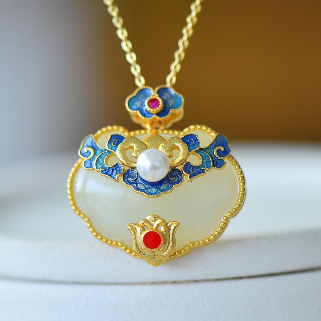 An Exquisite Sterling Silver-Gold Plated Inlaid White Jade Pendant: An Exquisite Sterling Silver-Gold Plated Inlaid White Jade Pendant 纯银镀金镶白玉吊坠