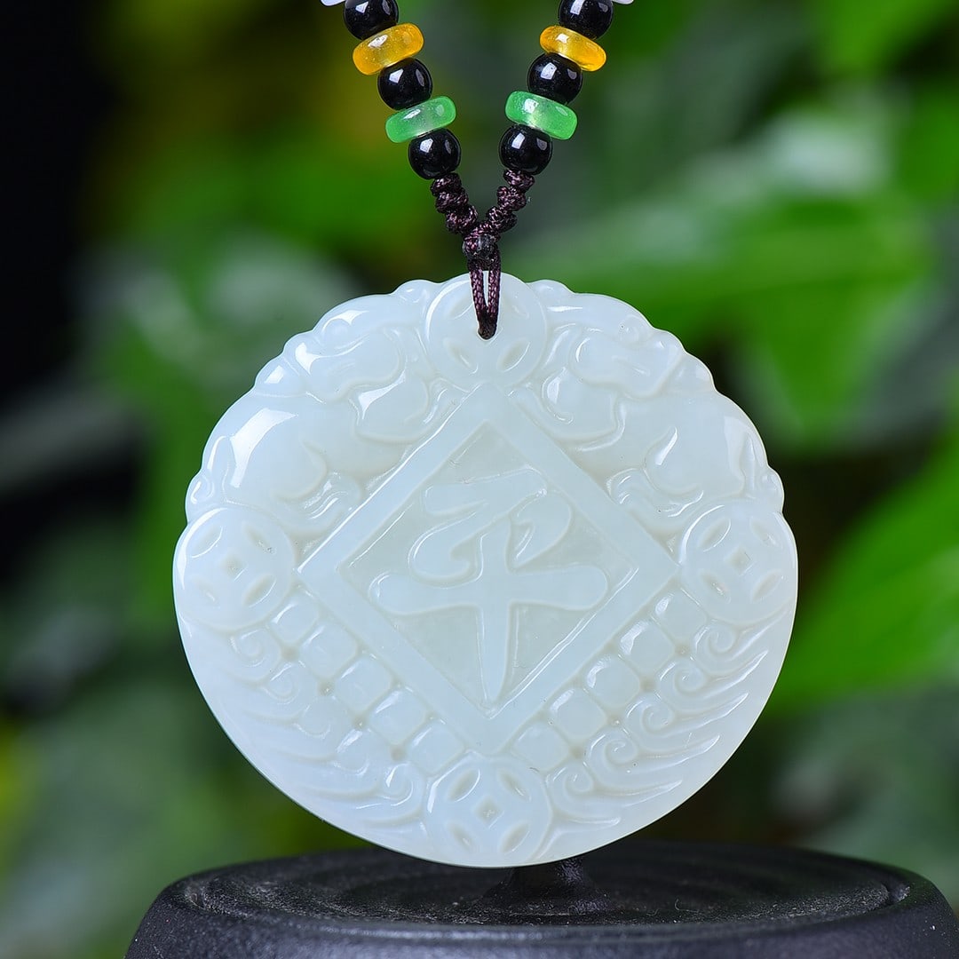 An Exquisite White Jade Pendant: An Exquisite White Jade Pendant,Size:47mmx50mm (寓意)招财进宝 辟邪 保平安 白玉吊坠
