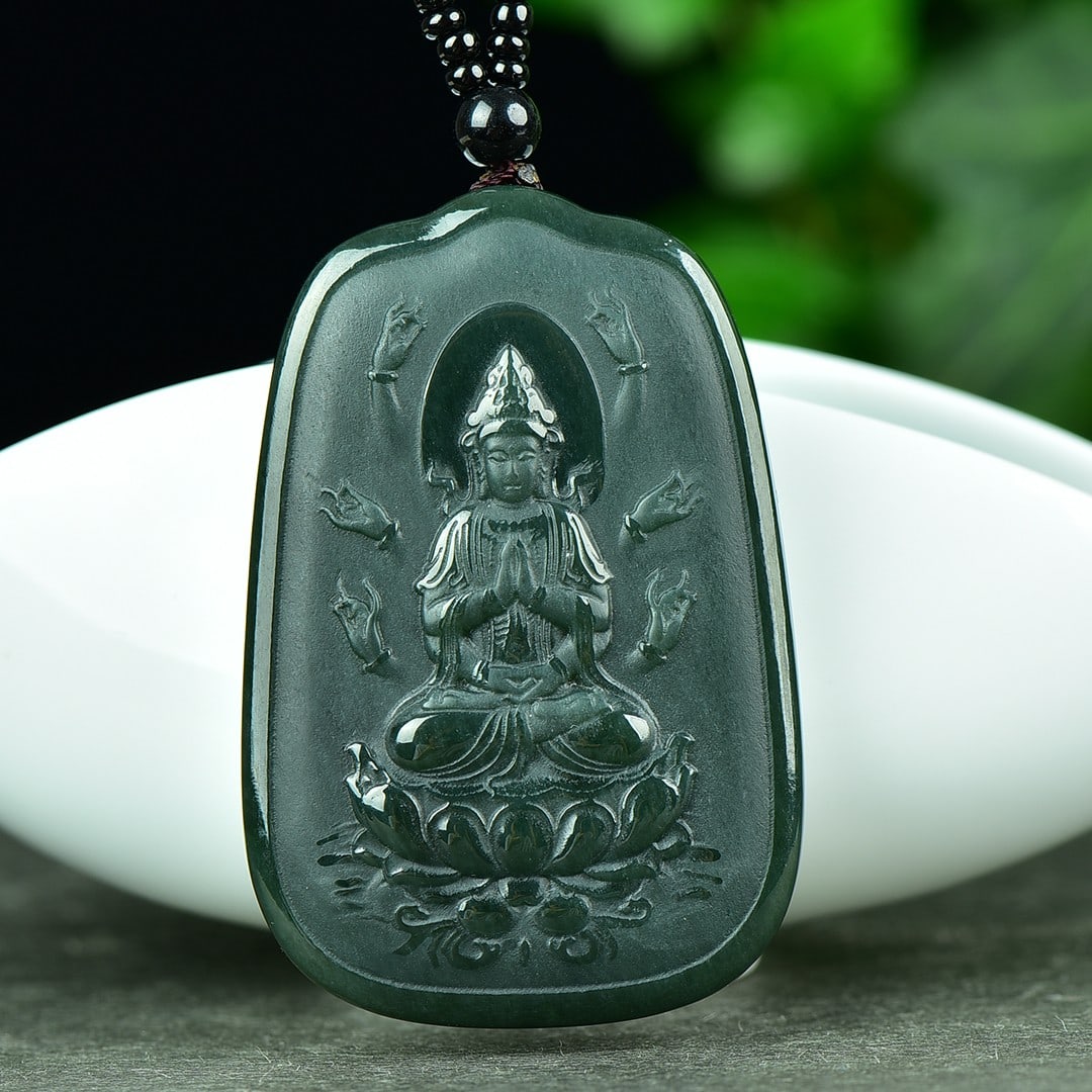 An Exquisite Sapphire Thousand-hand Guanyin Pattern Pendant: An Exquisite Sapphire Thousand-hand Guanyin Pattern Pendant,Size:41mmx66mm (寓意)吉祥 普度众生 保平安 青玉千手