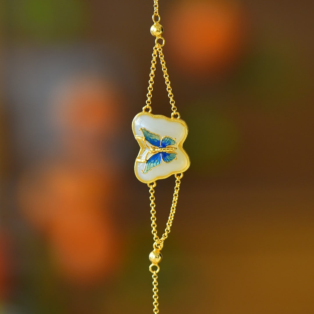 An Exquisite Sterling Silver-Gold Plated Inlaid White Jade Bracelet: An Exquisite Sterling Silver-Gold Plated Inlaid White Jade Bracelet,Size:14mmx19mm 纯银镀金镶白玉手链