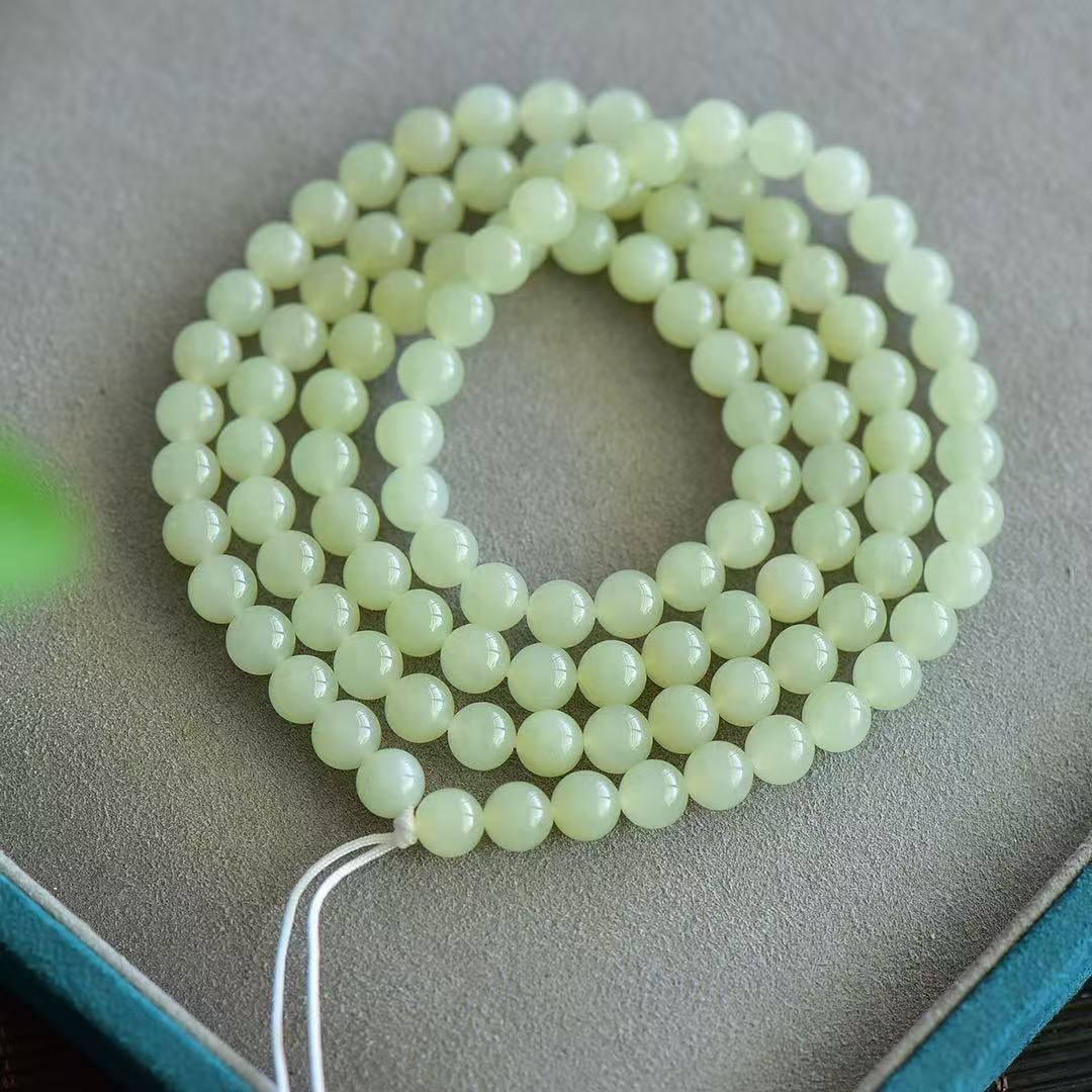 An Exquisite Greenish Jade Bracelets (1 of 4)