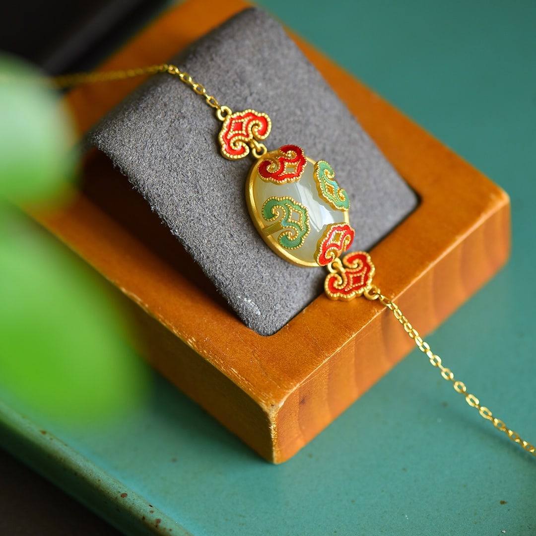 An Exquisite Sterling Silver-Gold Plated Inlaid White Jade Bracelet: An Exquisite Sterling Silver-Gold Plated Inlaid White Jade Bracelet 纯银镀金镶白玉手链