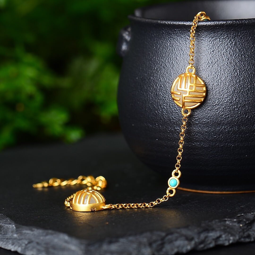 An Exquisite Sterling Silver-Gold Plated Inlaid White Jade Bracelet: An Exquisite Sterling Silver-Gold Plated Inlaid White Jade Bracelet,Size:8mmx8mm 纯银镀金镶白玉手链