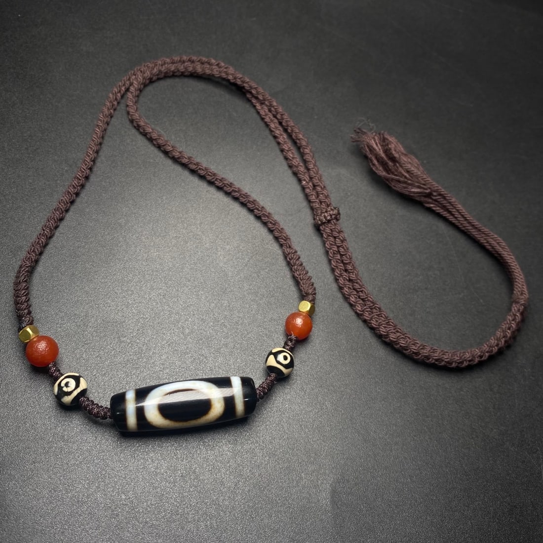 An Exquisite Dzi Bead Necklace: An Exquisite Dzi Bead Necklace,Size:36mmx12mm,Weight:15.7g 天珠项链
