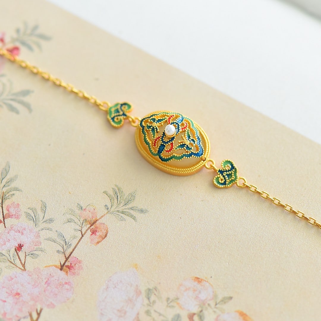 An Exquisite Sterling Silver-Gold Plated Inlaid White Jade Enamel Bracelet: An Exquisite Sterling Silver-Gold Plated Inlaid White Jade Enamel Bracelet,Size:10mmx14mm 纯银镀金镶白玉珐琅手链