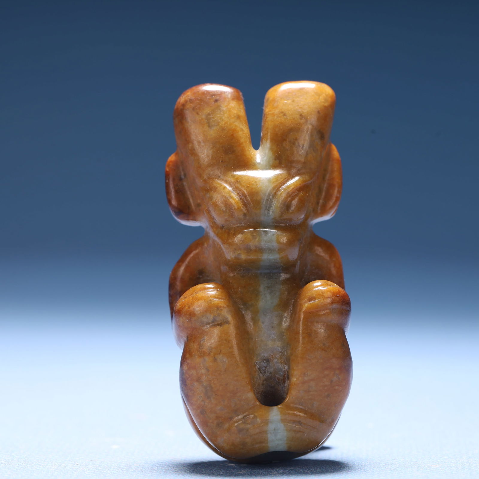 An Archaic Hongshan Culture Yellow Jade Figure Ornament: An Archaic Hongshan Culture Yellow Jade Figure Ornament,Ancient Time,China,Size:1.1inx0.7inx2.4in,Weight:56.7g 红山文化黄玉人物摆件,中