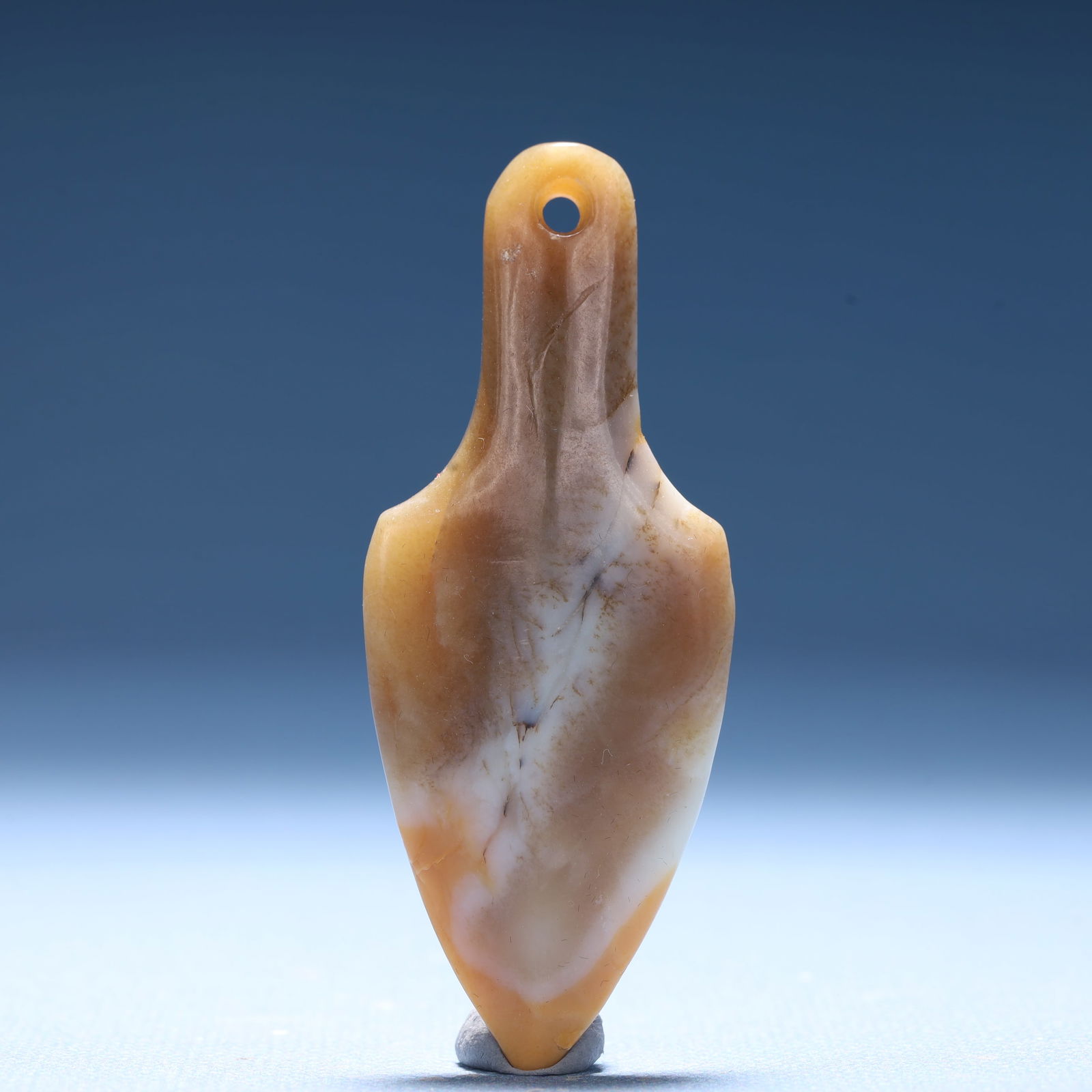 An Archaic Hongshan Culture Yellow Jade Pendant: An Archaic Hongshan Culture Yellow Jade Pendant,Ancient Time,China,Size:1.1inx0.4inx2.7in,Weight:20.3g 红山文化黄玉挂件,中国新石
