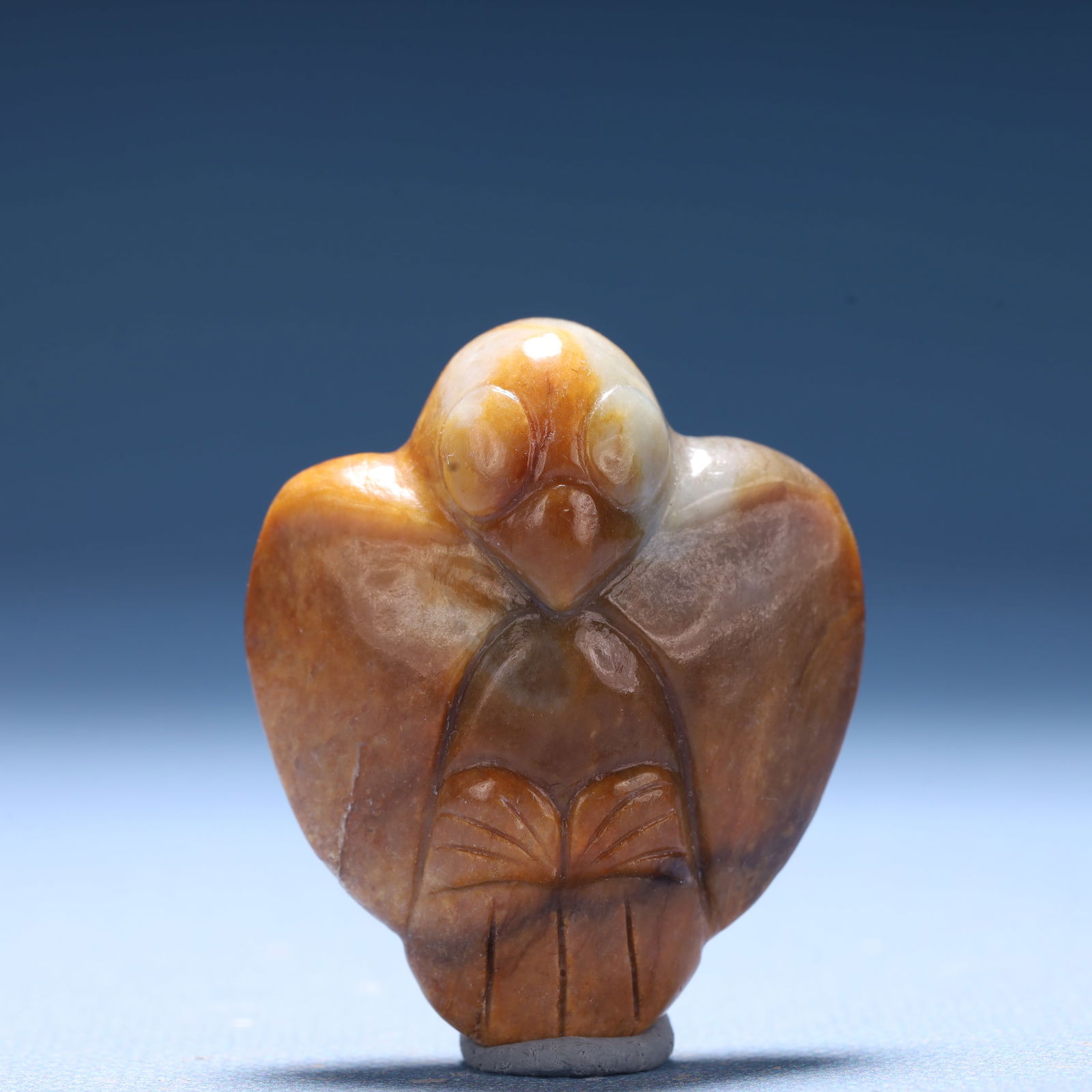 An Archaic Hongshan Culture Yellow Jade Bird Ornament: An Archaic Hongshan Culture Yellow Jade Bird Ornament,Ancient Time,China,Size:1.5inx0.8inx1.8in,Weight:39.5g 红山文化黄玉鸟摆件,中国&#