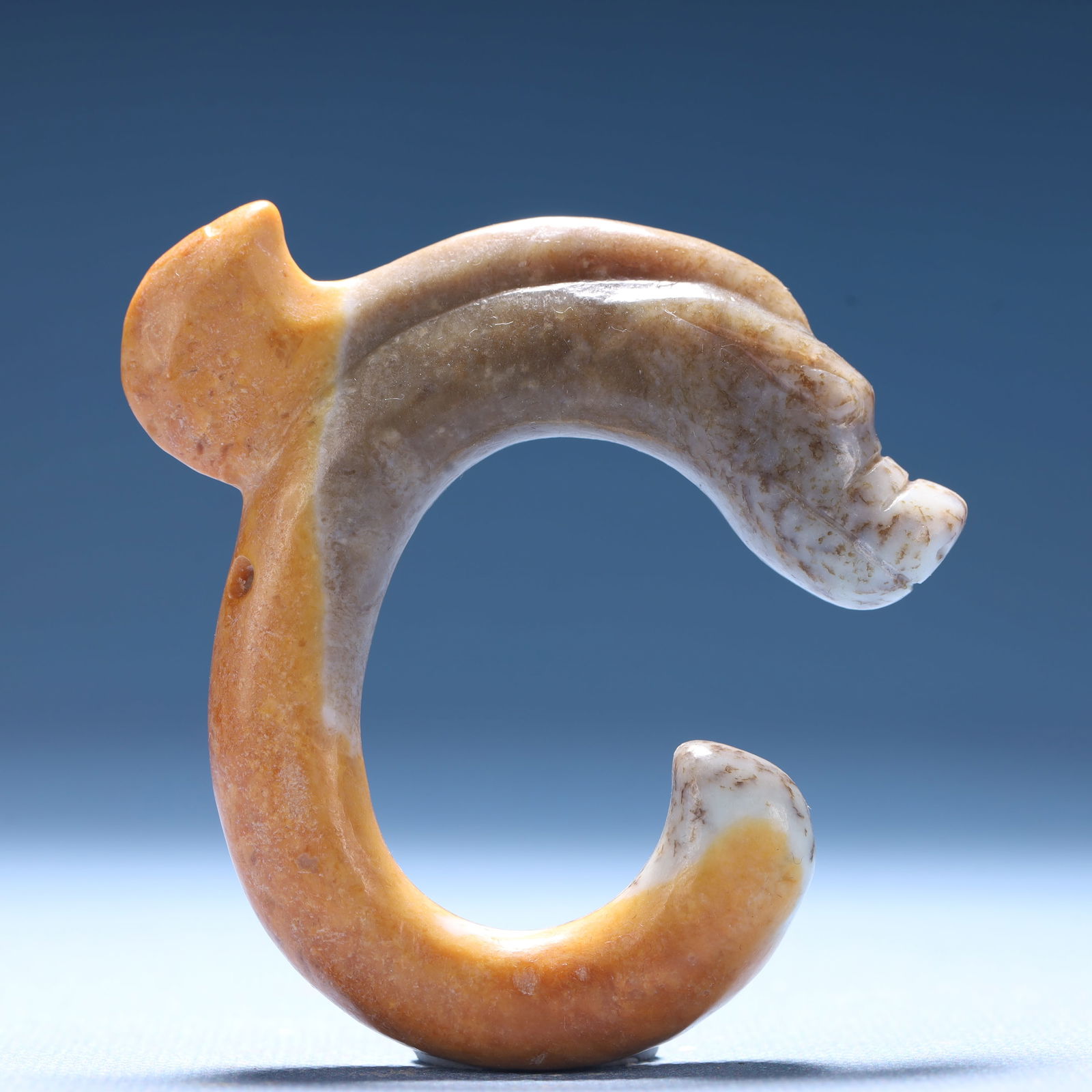 An Archaic Hongshan Culture Yellow Jade Pig and Dragon Pendant: An Archaic Hongshan Culture Yellow Jade Pig and Dragon Pendant,Ancient Time,China,Size:2.6inx0.5inx2.7in,Weight:49.3g 红山文化黄玉猪龙挂件,&