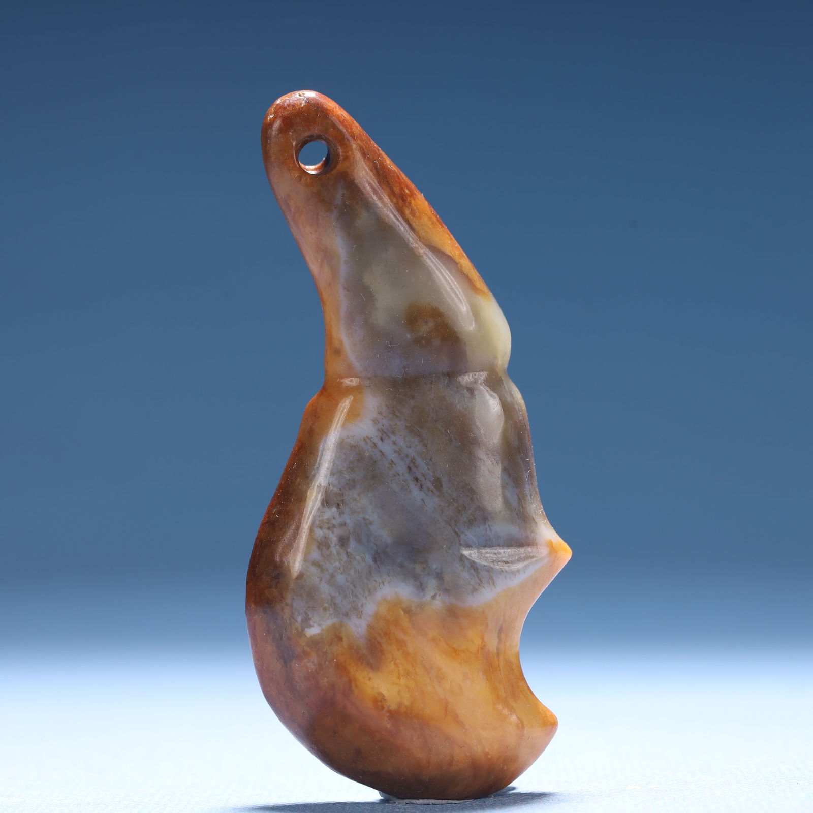 An Archaic Hongshan Culture Yellow Jade Pendant: An Archaic Hongshan Culture Yellow Jade Pendant,Ancient Time,China,Size:1.3inx0.6inx2.9in,Weight:41.8g 红山文化黄玉挂件,中国新石