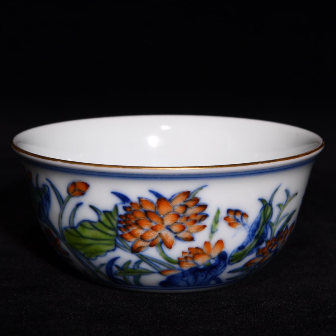 An Exquisite Blue and White Doucai Flower Pattern Cup: An Exquisite Blue and White Doucai Flower Pattern Cup,Qing Dynasty,China,Qianlong Six-Character Mark,Size:1.5inx3.3in 