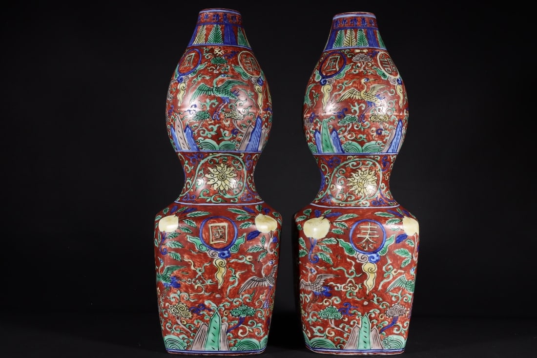 A Pair of Rare Red Ground Blue and White Flower and Phoenix Pattern Gourd-Shaped Vases: A Pair of Rare Red Ground Blue and White Flower and Phoenix Pattern Gourd-Shaped Vases,Ming Dynasty,China,Jiajing Six-Character Mark,Size:13.8inx5.1in 