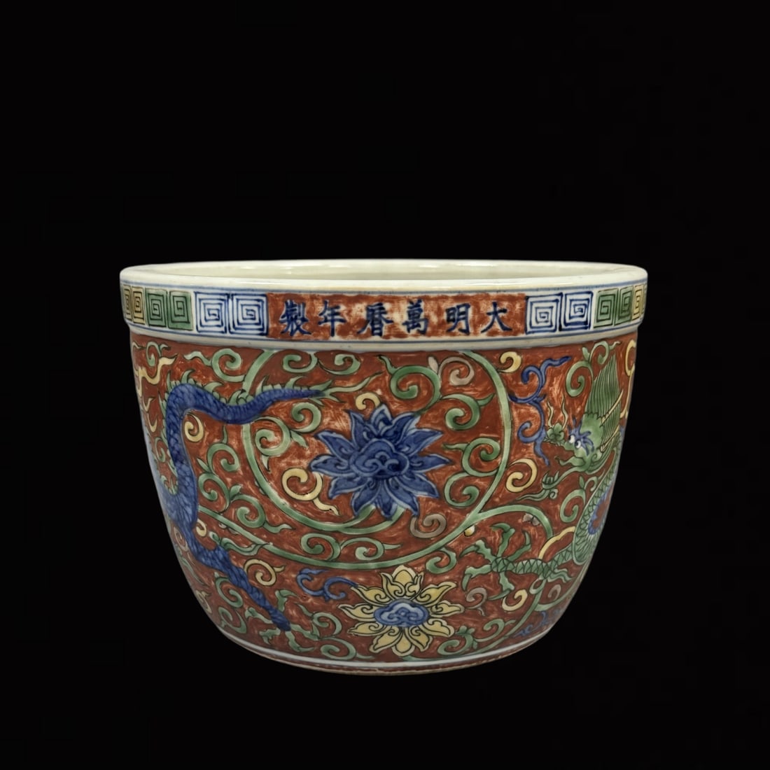 An Exquisite Blue and White Red Ground Flower and Dragon Pattern Vat: An Exquisite Blue and White Red Ground Flower and Dragon Pattern Vat,Ming Dynasty,China,Wanli Six-Character Mark,Size:5.5inx7.9in 青花红地花卉龙纹ಸ