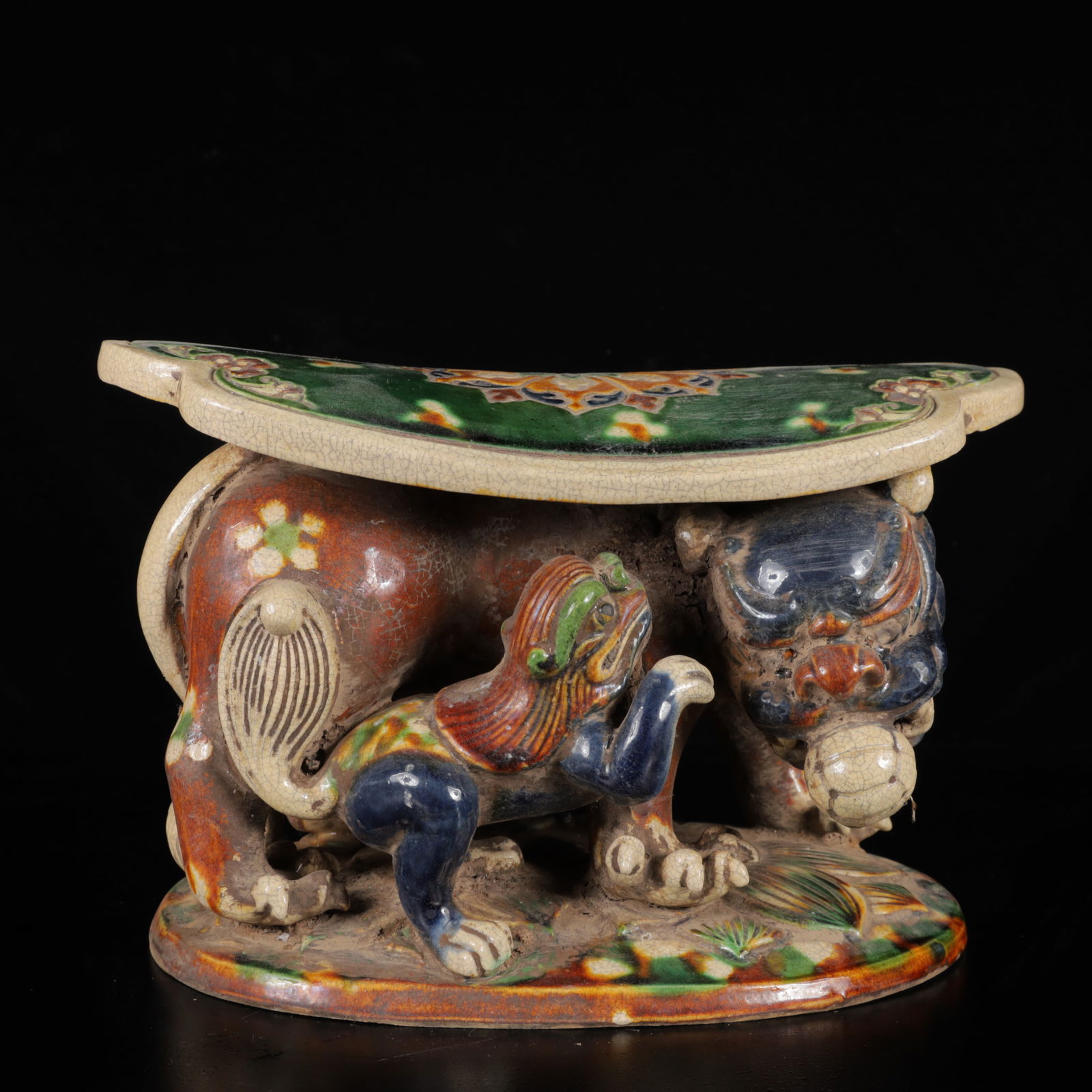 An Exquisite Tang Tri-Color Glazed Pottery Auspicious Beast Pillow: An Exquisite Tang Tri-Color Glazed Pottery Auspicious Beast Pillow,Tang Dynasty,China,Size:9.8inx6.3inx5.9in,Weight:2700g 
