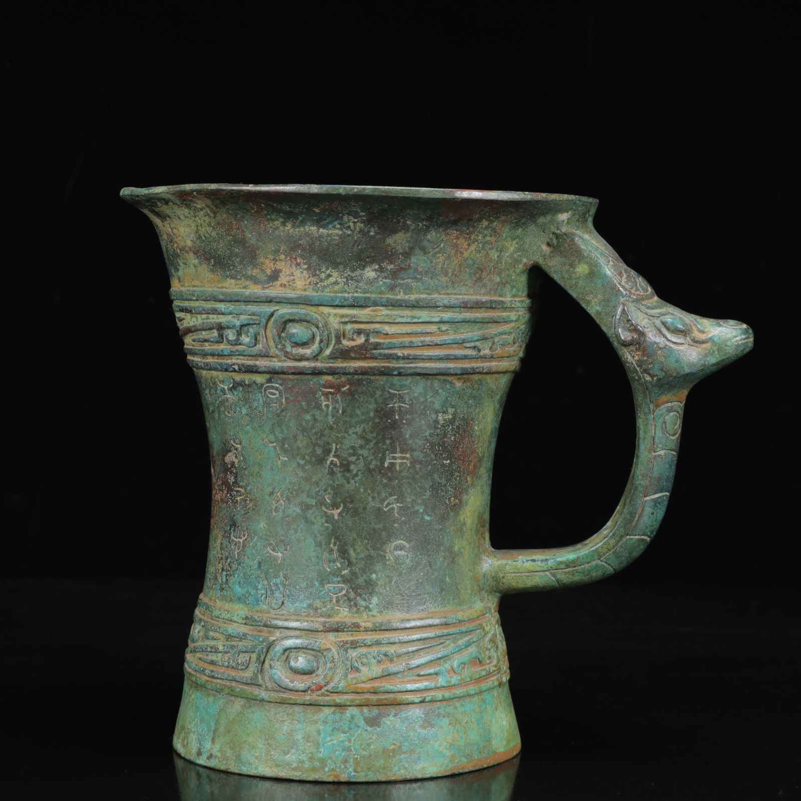 An Archaic Bronze Inscription Auspicious Beast Ewer: An Archaic Bronze Inscription Auspicious Beast Ewer,the Warring States Period in China,Size:7.9inx5.7inx7.1in,Weight:1550g 