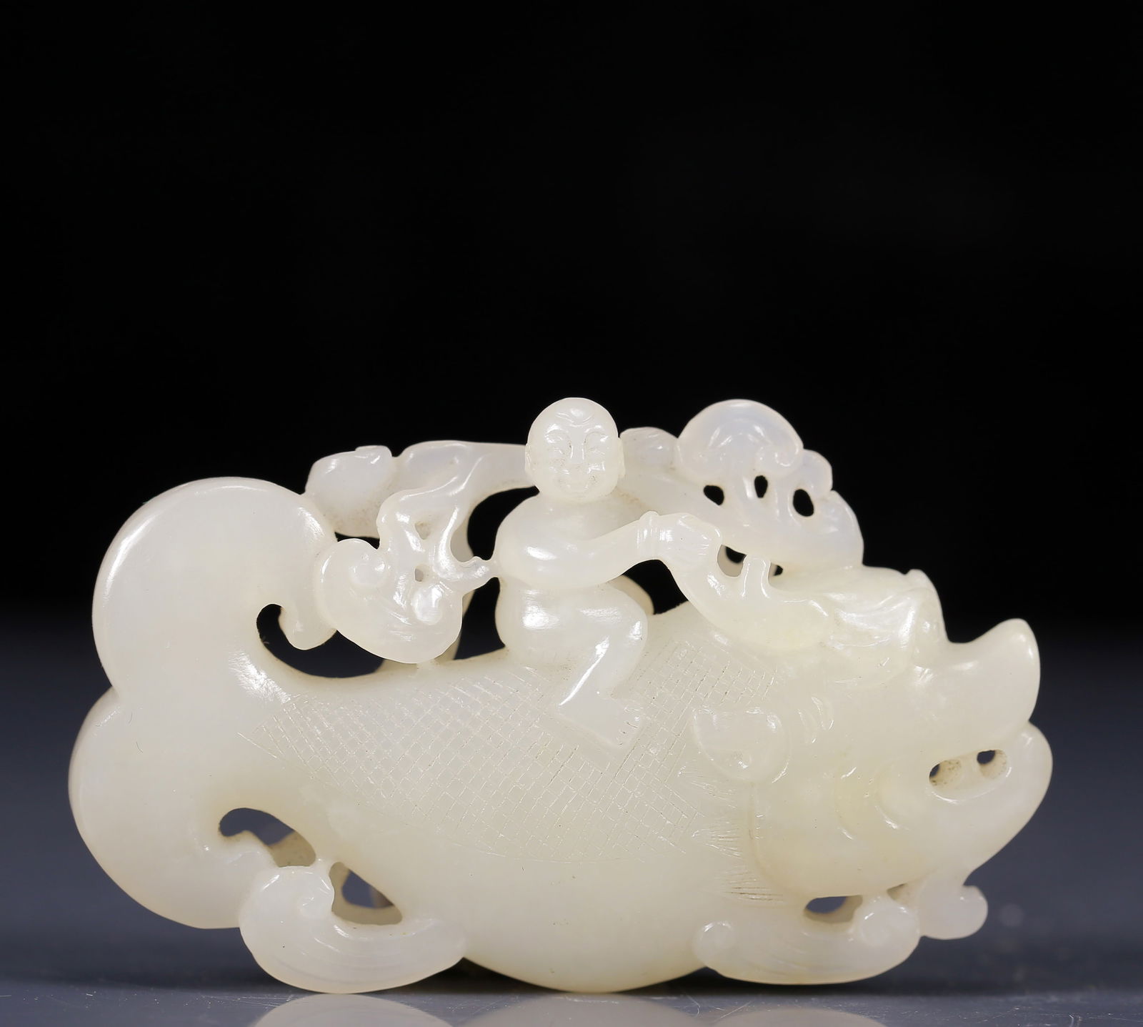 An Exquisite White Jade Fish Pendant (1 of 4)