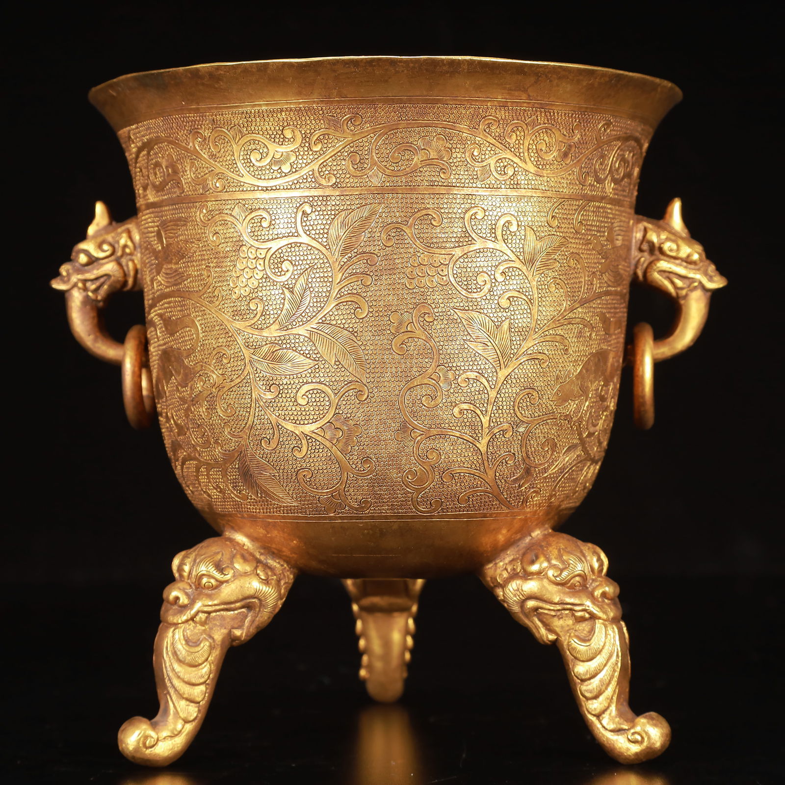 An Exquisite Gilt Bronze Flower and Auspicious Beast Pattern Double-Ears and Tripod Cup: An Exquisite Gilt Bronze Flower and Auspicious Beast Pattern Double-Ears and Tripod Cup,Qing Dynasty, China,Size:5.9inx6.3in,Weight:1500g 