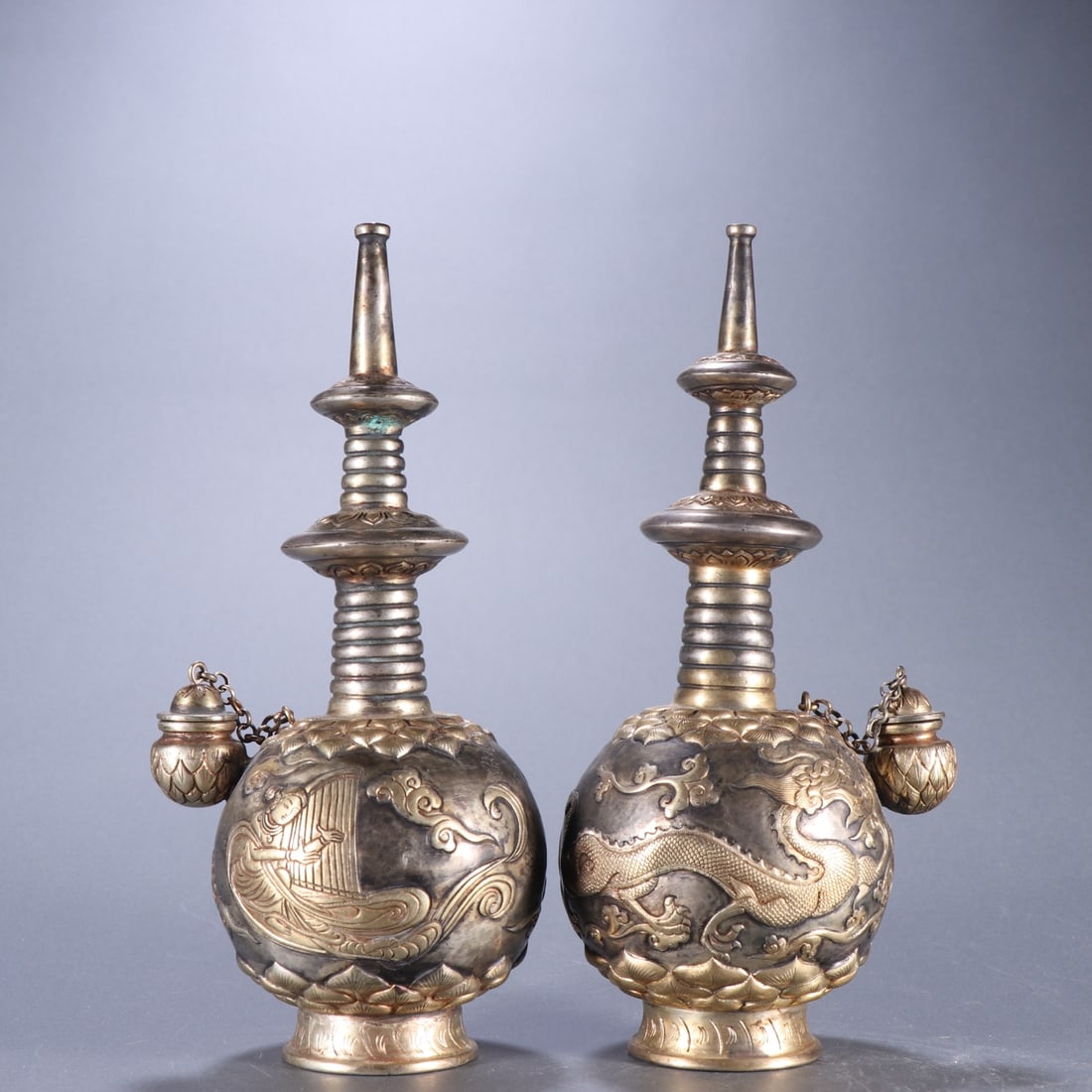 A Pair of Exquisite Silver Dragon Pattern Vases: A Pair of Exquisite Silver Dragon Pattern Vases,Qing Dynasty, China,Size:7.5inx3.1in Weight:375.6g 银鎏金龙纹瓶一对,中国清代