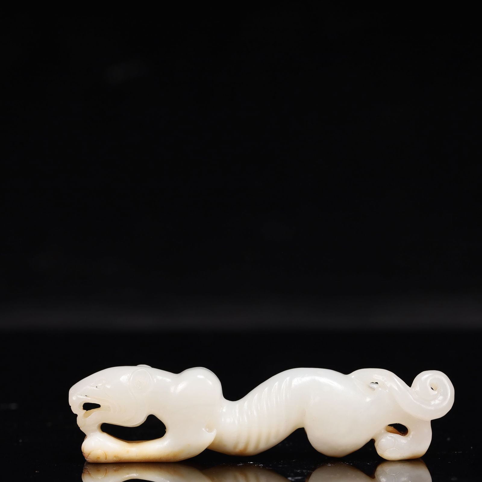 An Archaic Hongshan Culture White Jade Tiger Pendant: An Archaic Hongshan Culture White Jade Tiger Pendant,Ancient Time, China,Size:3.5inx0.6inx0.9in,Weight:58g 红山文化白玉老虎挂件,中