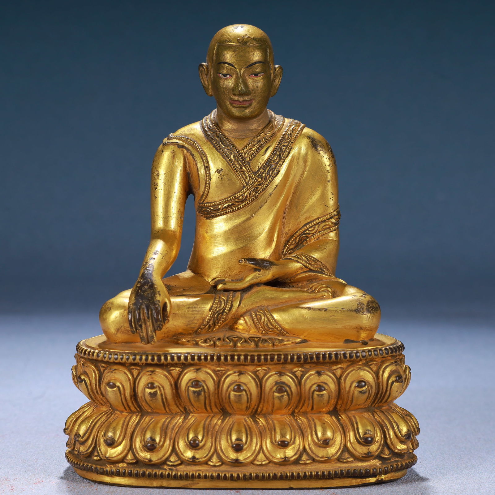 A Solemn Gilt Bronze Statue of Guru: A Solemn Gilt Bronze Statue of Guru,Qing Dynasty, China,Size:3.9inx2.8inx5.1in,Weight:750g 铜鎏金上师像,中国清代