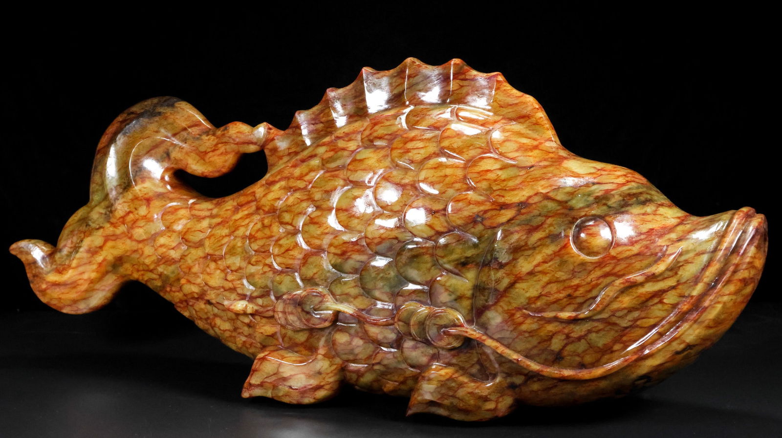 An Exquisite Archaic Jade Fish Ornament (1 of 9)