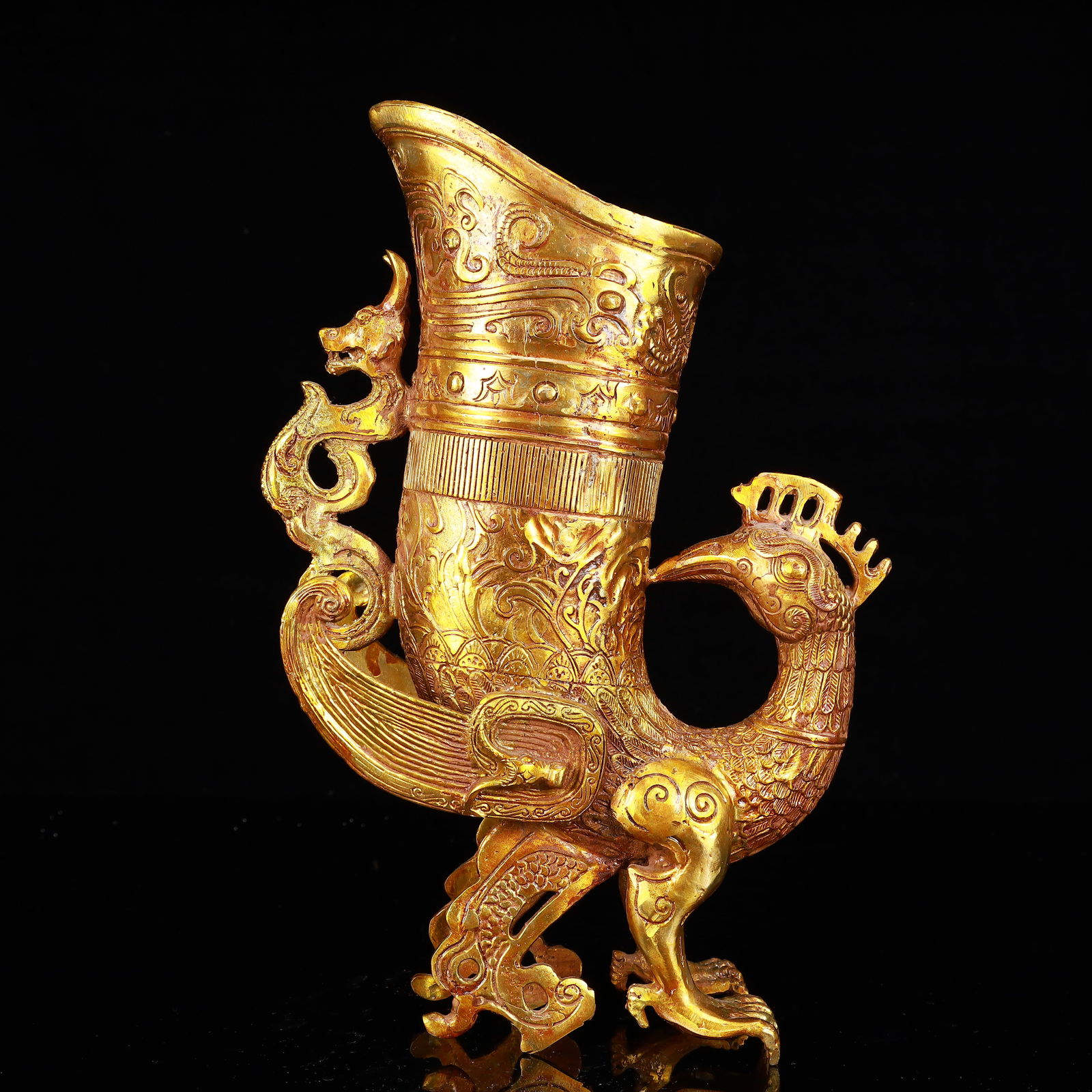A Rare Gilt Bronze Phoenix Libation Goblet: A Rare Gilt Bronze Phoenix Goblet,The Warring States period in China,Size:7.9inx3.1inx12.2in,Weight:2000g 