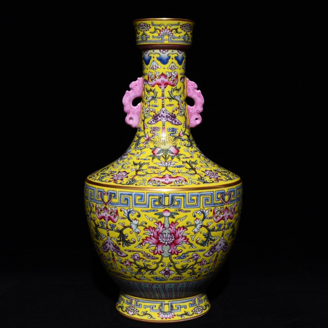 A Rare Yellow Ground Famille-Rose Painted Gold Lotus Pattern Double-Ears Vase: A Rare Yellow Ground Famille-Rose Painted Gold Lotus Pattern Double-Ears Vase,Qing Dynasty,China,Qianlong Six-Character Mark,Size:13.4inx7.5in 