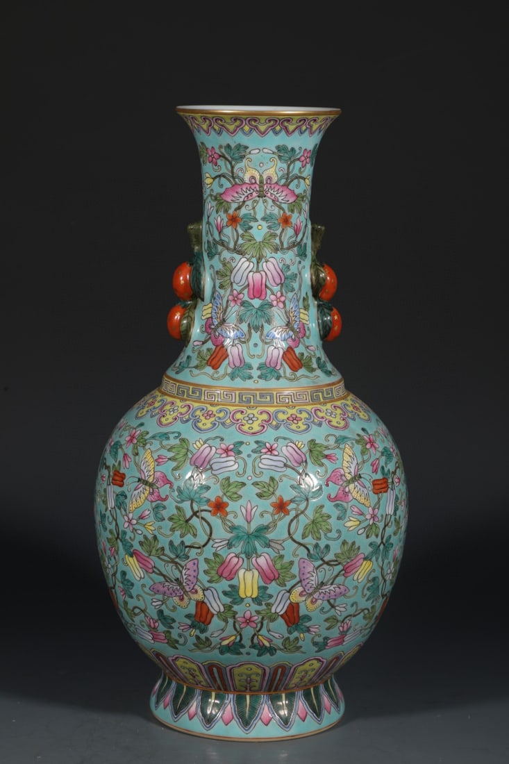 An Exquisite Turquoise Glazed Famille-Rose Flower and Butterfly Pattern Double-Ears Vase: An Exquisite Turquoise Glazed Famille-Rose Flower and Butterfly Pattern Double-Ears Vase,Qing Dynasty,China,Qianlong Six-character Mark,Size:13.3inx7.1in 