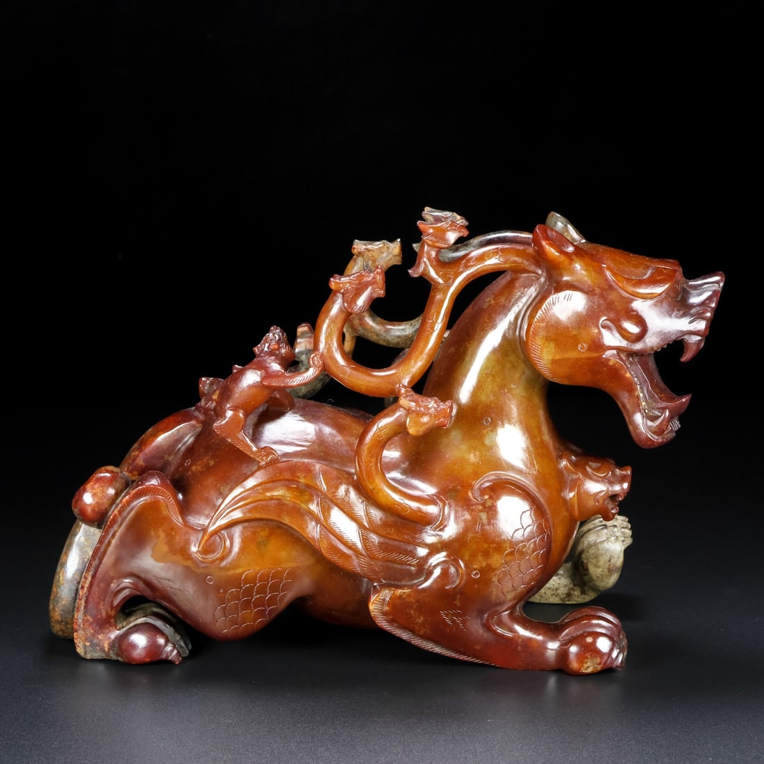 An Exquisite Archaic Jade Beast Ornament (1 of 9)