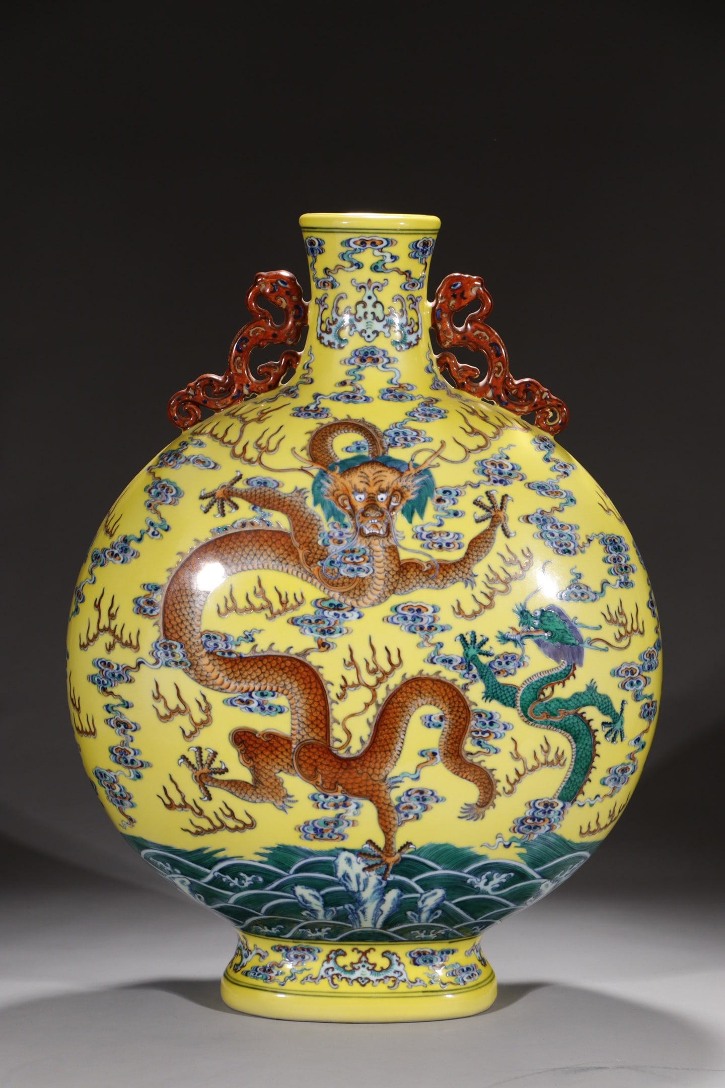 An Exquisite Yellow Ground Doucai Auspicious Cloud and Dragon Pattern Double-Ears Vase: An Exquisite Yellow Ground Doucai Auspicious Cloud and Dragon Pattern Double-Ears Vase,Qing Dynasty,China,Qianlong Six-character Mark,Size:20.5in 
