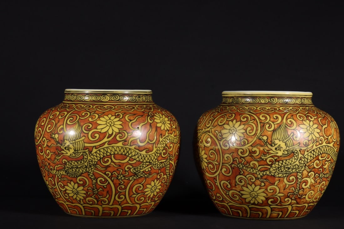 A Pair of Exquisite Red Ground Yellow Glazed Flower and Dragon Pattern Jars: A Pair of Exquisite Red Ground Yellow Glazed Flower and Dragon Pattern Jars,Ming Dynasty,China,Jiajing Six-Character Mark,Size:5.1inx5.9in 