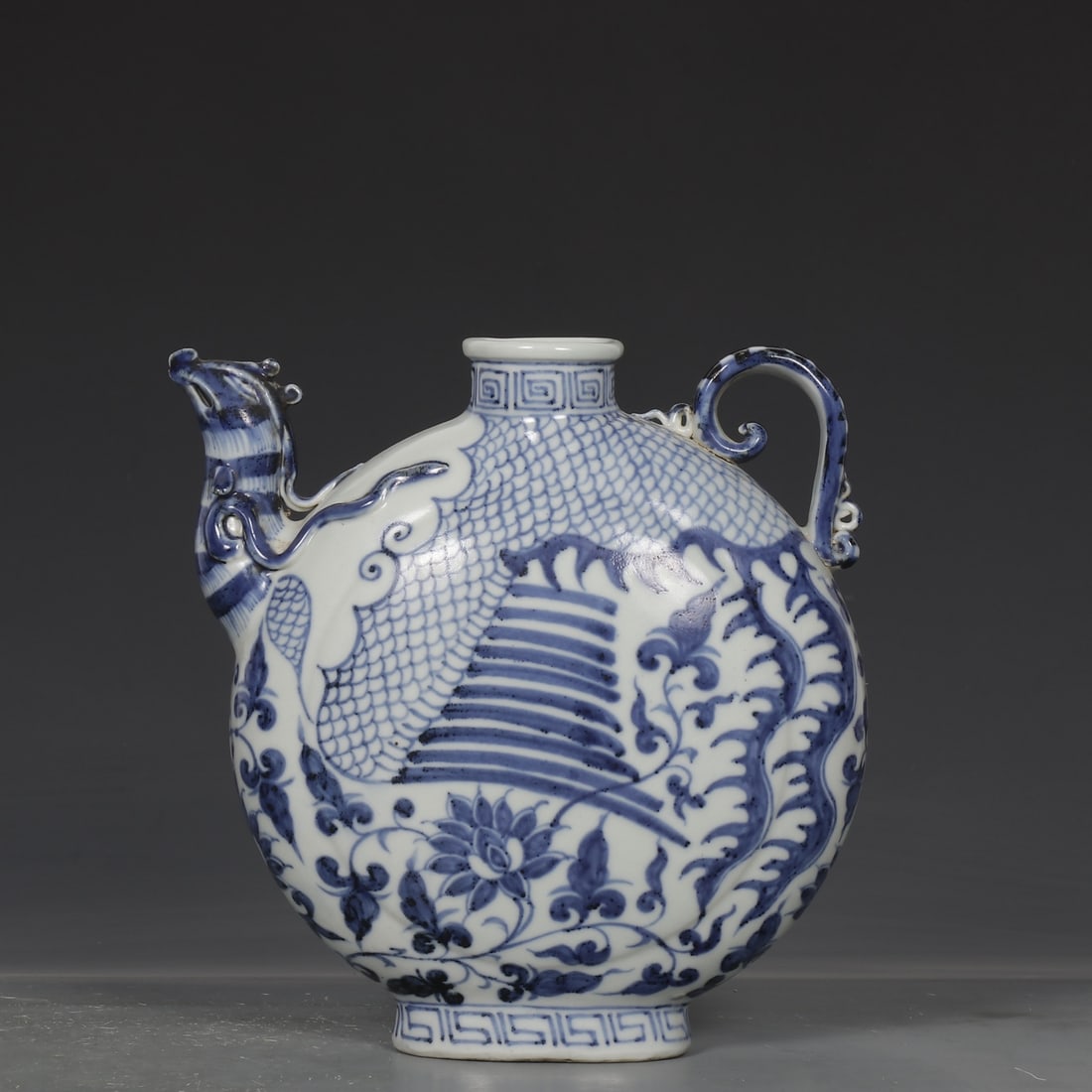 An Exquisite Blue and White Lotus and Phoenix Pattern Pot: An Exquisite Blue and White Lotus and Phoenix Pattern Pot,Yuan Dynasty,China,Size:7.7inx6.7in 青花缠枝莲凤纹壶,中国元代