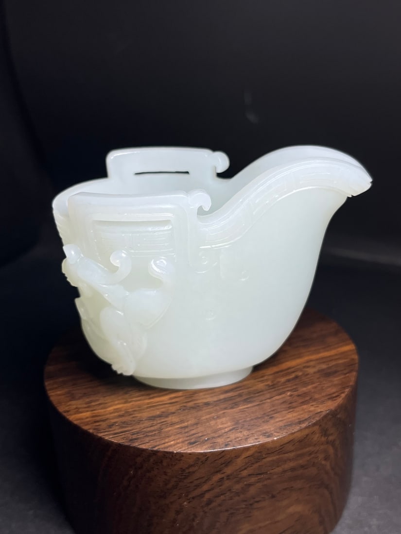 An Exquisite White Jade Chi-Dragon Pattern Libation Cup (1 of 7)