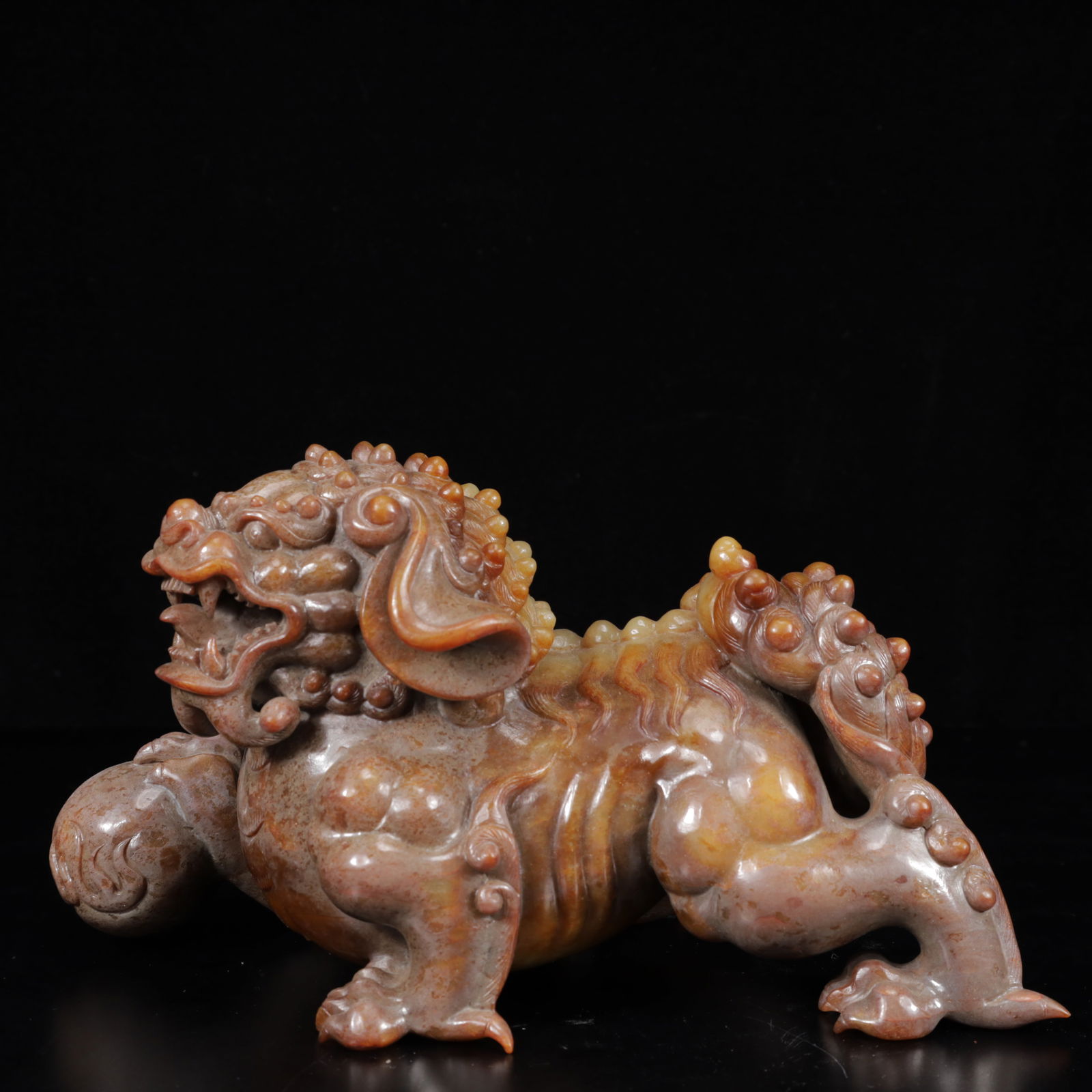 An Exquisite Yellow Jade Lion Ornament (1 of 13)