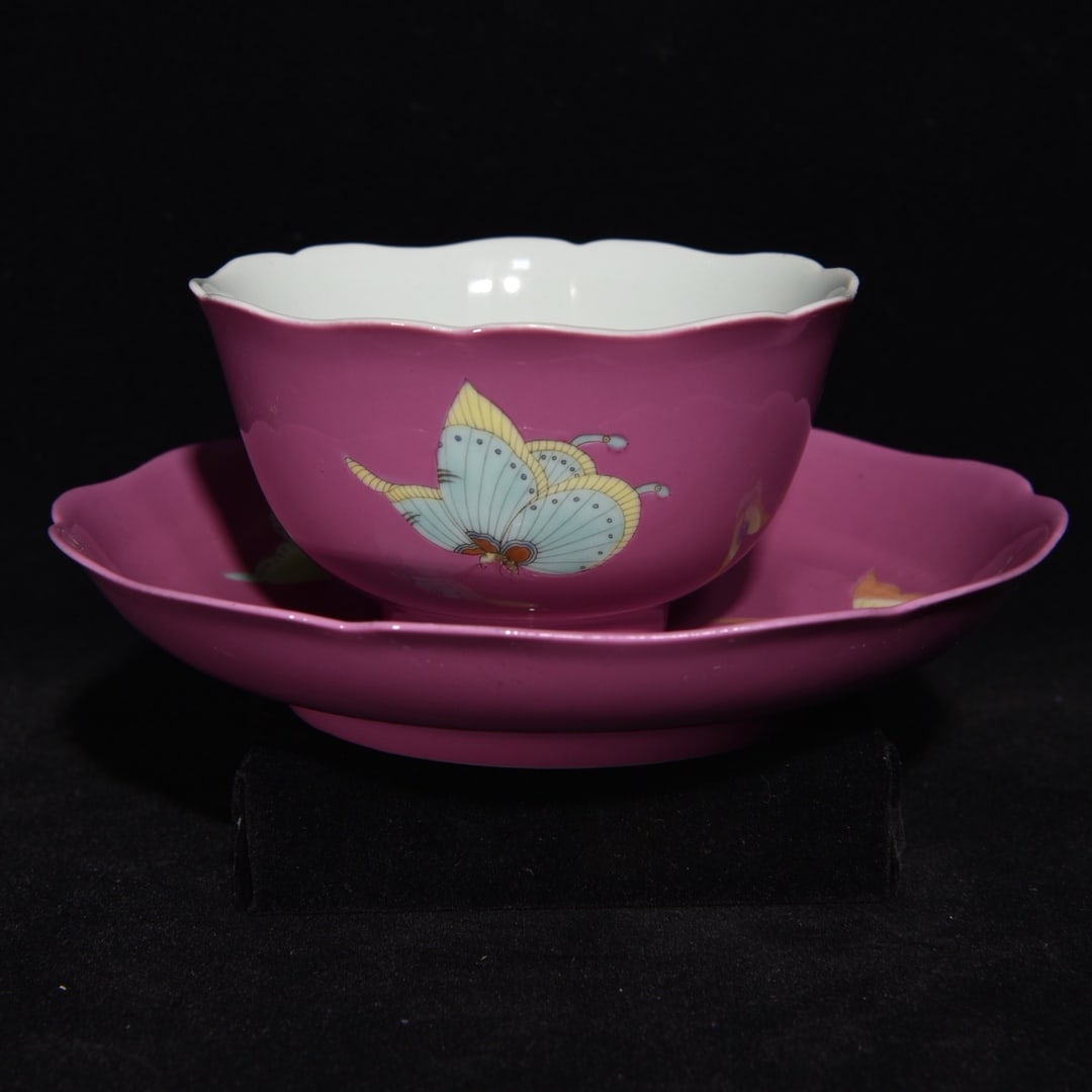 An Exquisite Ruby Red Glazed Famille-Rose Butterfly Pattern Cup,with Plate: An Exquisite Ruby Red Glazed Famille-Rose Butterfly Pattern Cup,with Plate,Qing Dynasty,China,Yongzheng Six-Character Mark,Size:(Plate)1.3inx6.7in,(Bowl)2.4inx4.3in 