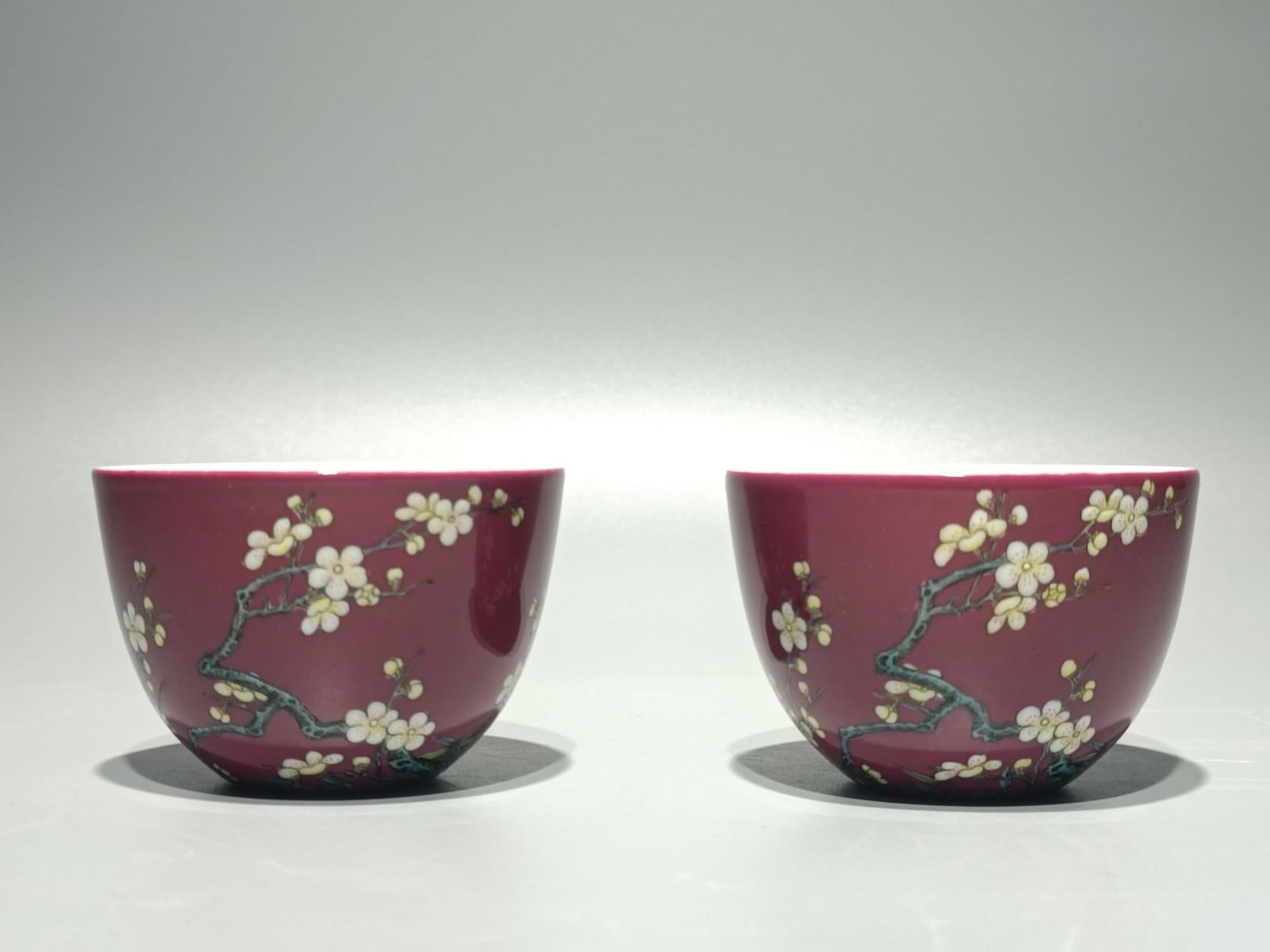 A Pair of Exquisite Famille-Rose Ruby Red-Glazed Plum Blossom Pattern Cups: A Pair of Exquisite Famille-Rose Ruby Red-Glazed Plum Blossom Pattern Cups,Qing Dynasty,China,Yongzheng Four-character Mark,Size:2.4inx3in 