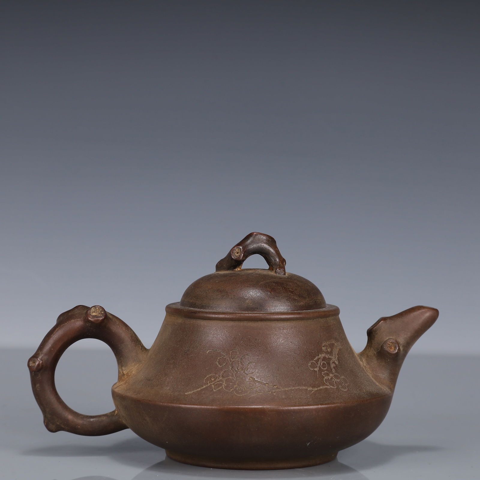 An Exquisite Purple Sands Plum Blossom Pattern Teapot, With poem: An Exquisite Purple Sands Plum Blossom Pattern Teapot, With poem,Qing Dynasty, China,Shen Xi Mark,Size:7.1inx4.7inx3.5in,Weight:412g 