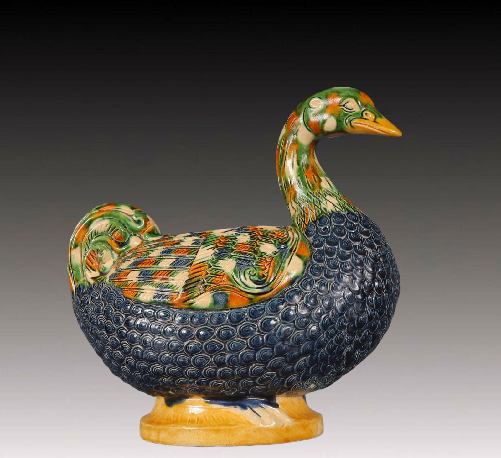 An Exquisite Tang Tri-Color Glazed Pottery Duck-Shaped Jar (1 of 9)