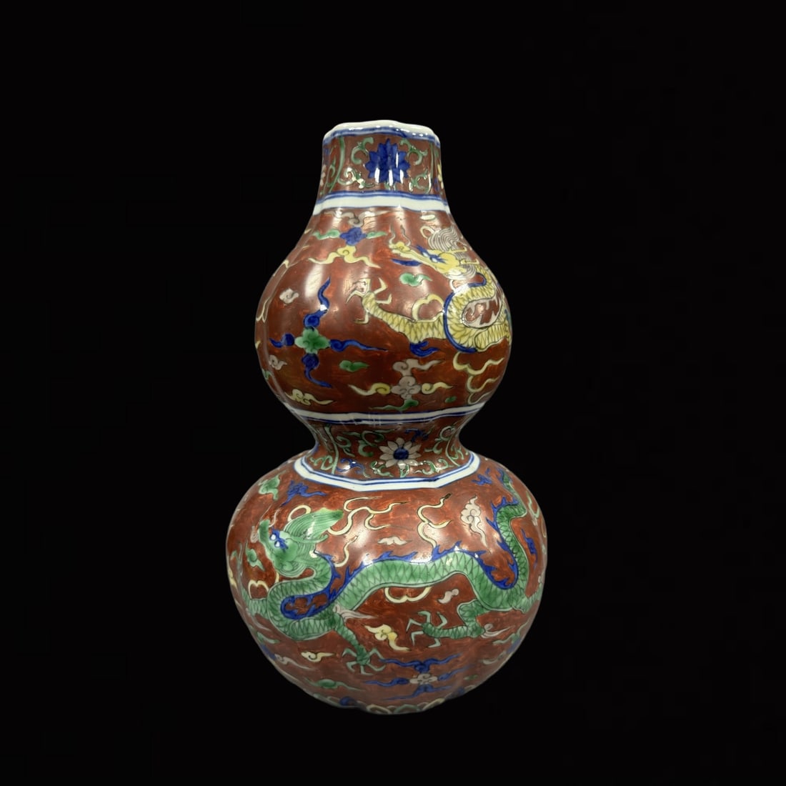 An Exquisite Blue and White Red Ground Auspicious Cloud and Dragon Pattern Gourd-Shaped Vase: An Exquisite Blue and White Red Ground Auspicious Cloud and Dragon Pattern Gourd-Shaped Vase,Ming Dynasty,China,Jiajing Six-Character Mark,Size:10.2inx6.3in 青花红地祥